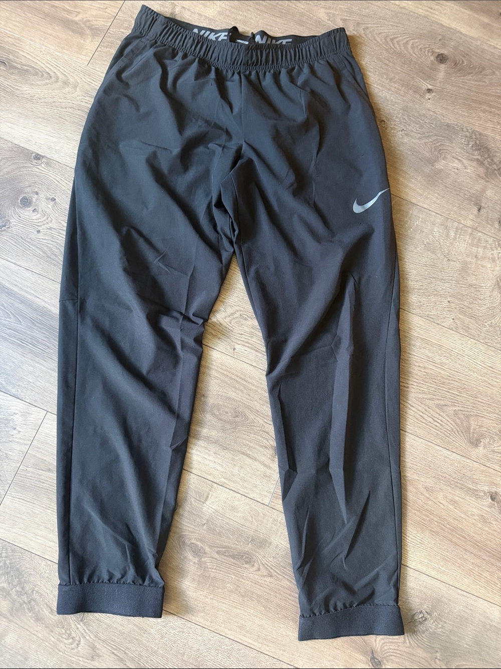 Nike MAN DRI-FIT Black Jogger Track Pants with Swoosh